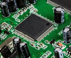 Electronic circuit board with chip and radio components