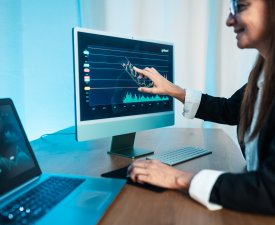 Financial analyst working on stock exchange market in modern office - Fintech concept